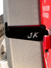 Load image into Gallery viewer, Front driver's side foot peg mounted on the Jeep JKU with JK cutout