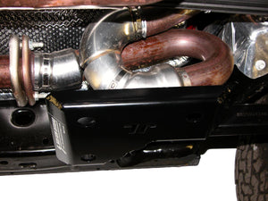 Exhaust loop skid plate mounted on the Jeep Wrangler JL shown protecting the loop in the exhaust