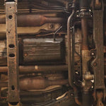 Load image into Gallery viewer, 1st Gen Toyota Tundra transmission without skid plate protection.
