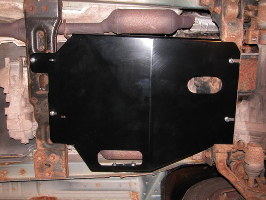 View of the Engine/Transmission skid plate mounted from under the Jeep