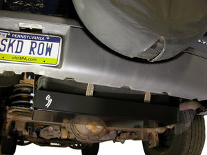 Close up view of the gas tank skid plate installed on a Jeep Liberty KJ