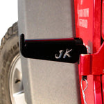 Load image into Gallery viewer, Front driver's side foot peg mounted on the Jeep JKU with JK cutout
